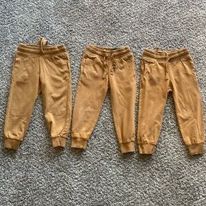 Toddler boy, drawstring, tan sweat pants.